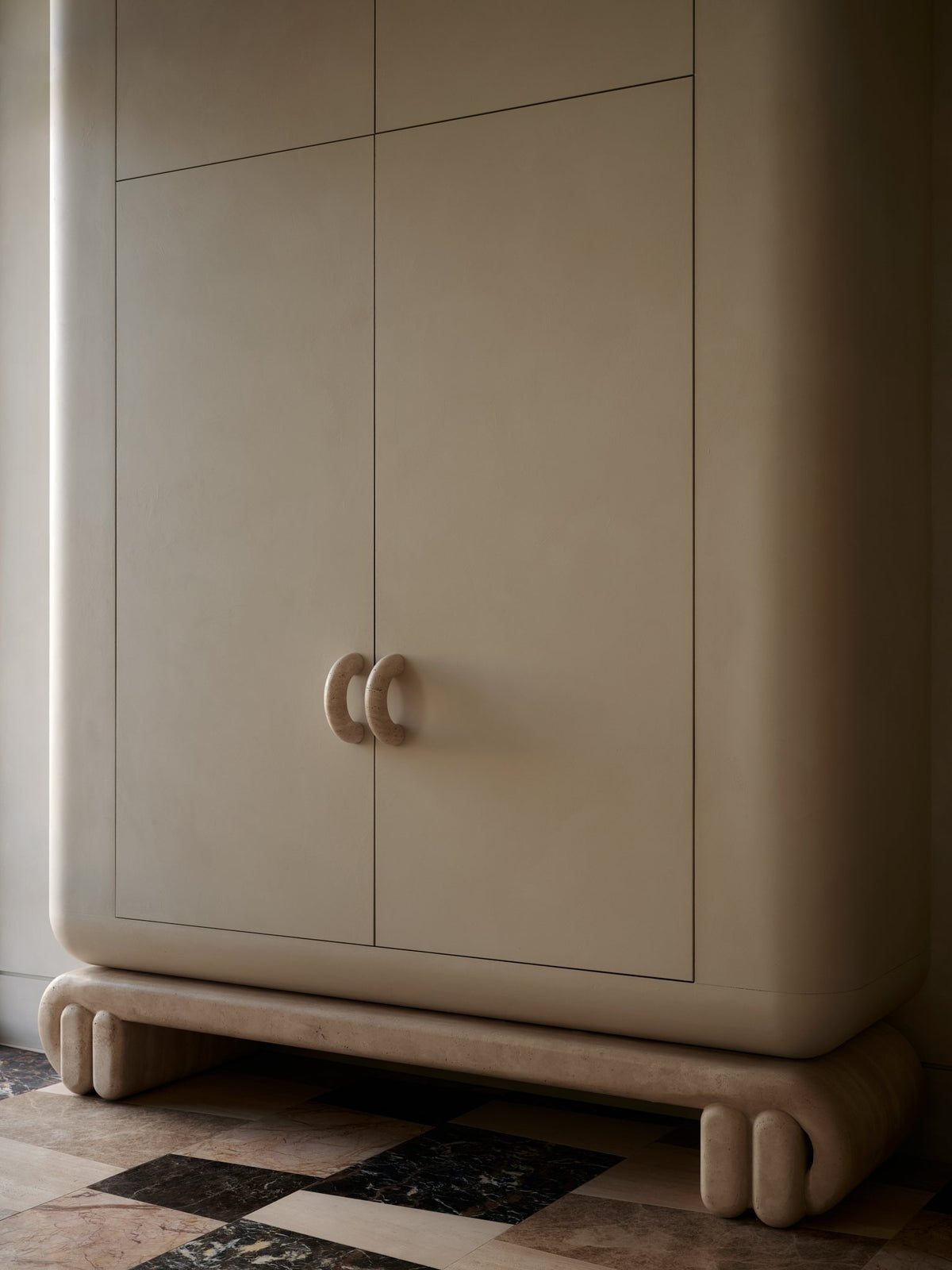 Plaster armoire with Lane Donut stone handles