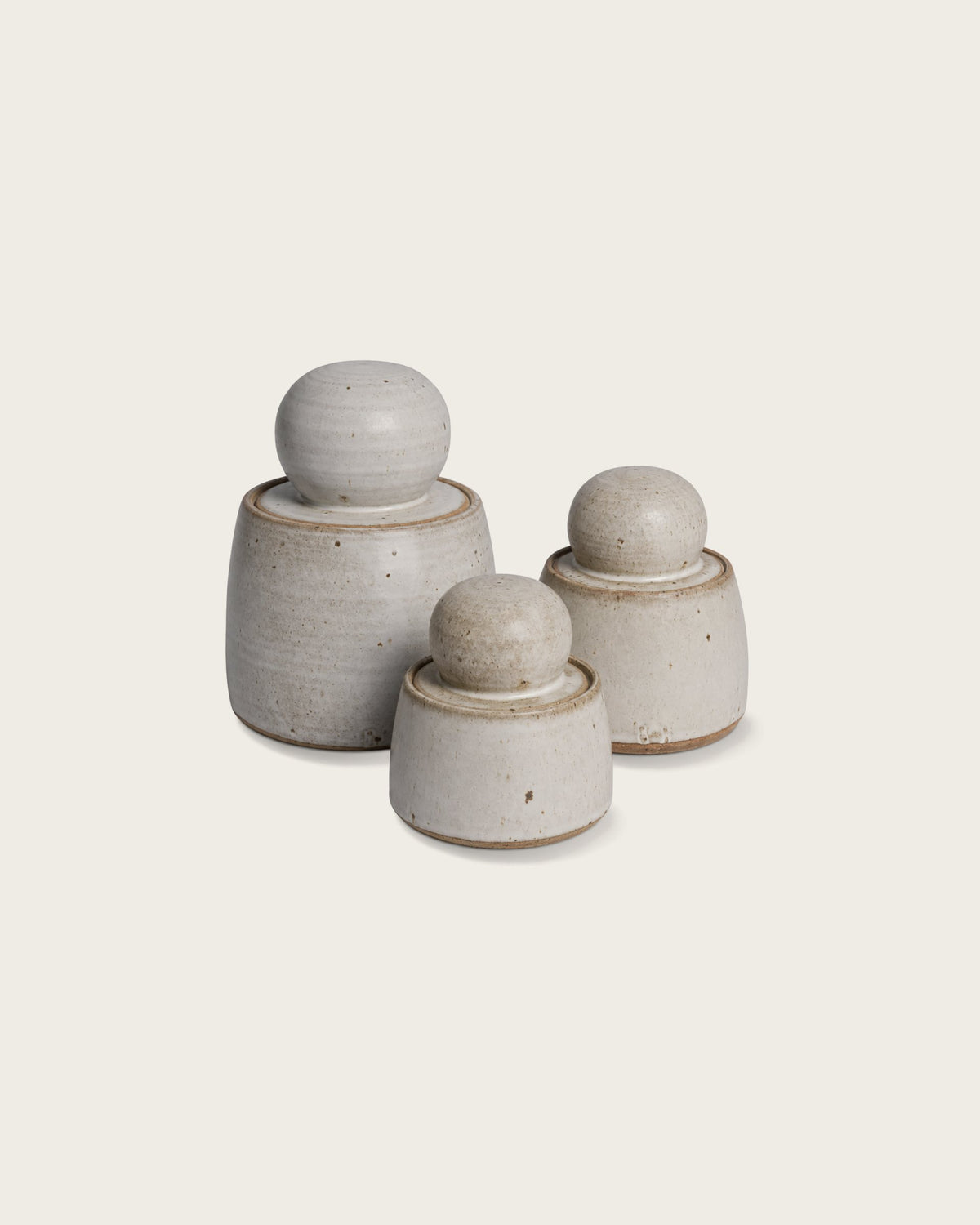 Three lidded ceramic stash pots